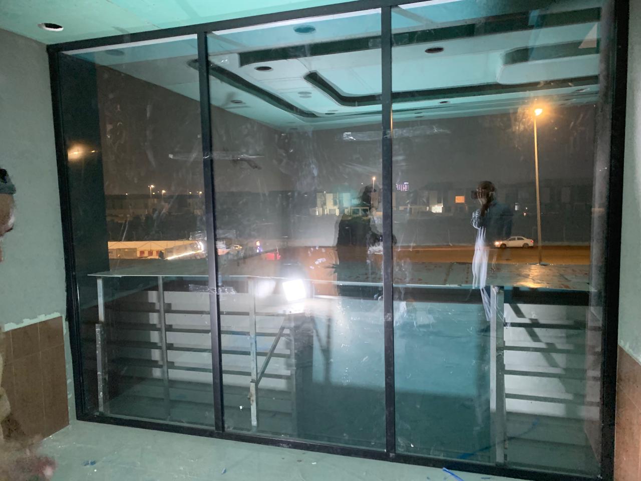 Corporate glass corridor partition